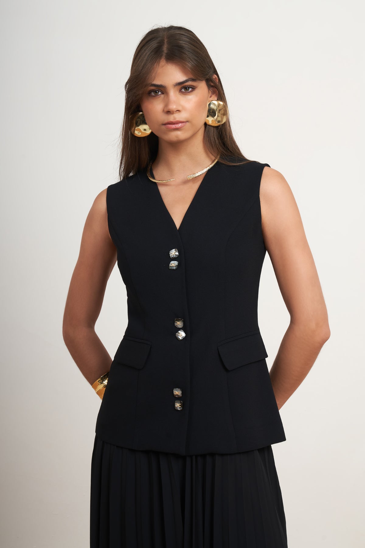 Elegant Pleated Skirt Set with Tailored Vest