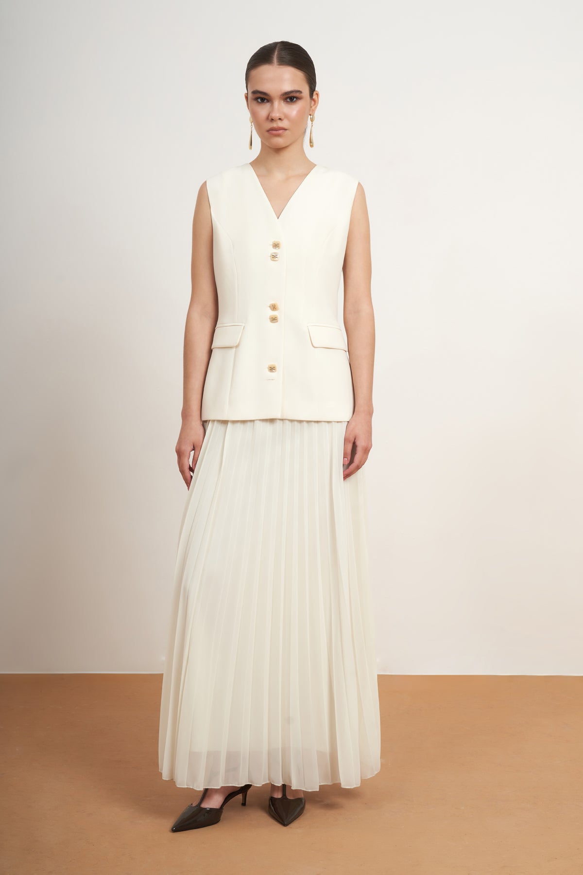 Elegant Pleated Skirt Set with Tailored Vest