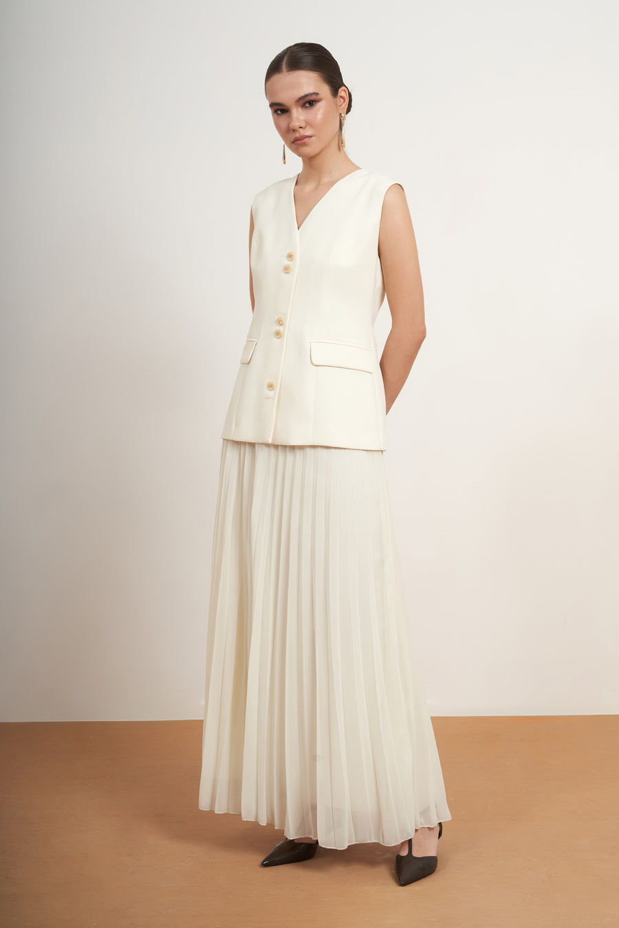 Elegant Pleated Skirt Set with Tailored Vest