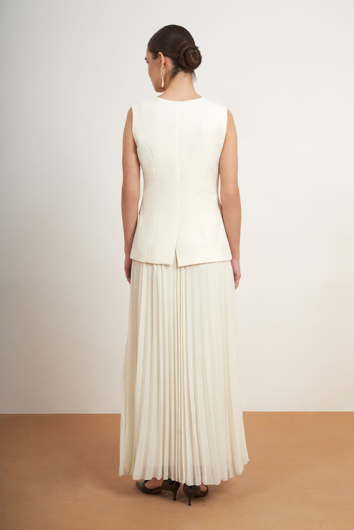 Elegant Pleated Skirt Set with Tailored Vest